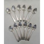 A set of six George III silver tablespoons, together with a set of six dessert spoons,