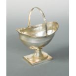A George III silver swing handled sugar basket by Henry Chawner & John Eames,