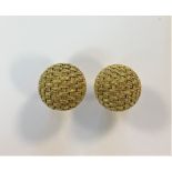 A pair of woven 'bombé' style earstuds,