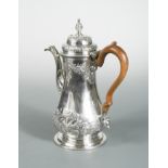 A George II silver coffee pot,