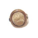 A Neo Classical design double intaglio swivel head ring,