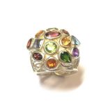 A modern multi gemstone ring,