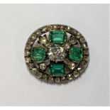 A 19th Century emerald and diamond brooch,