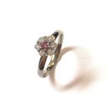 A modern pink and white diamond cluster ring,