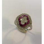 An Art Deco style ruby and diamond cluster ring,