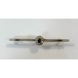 A sapphire and diamond cluster bar brooch,
