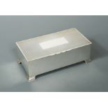 A George VI silver table cigarette casket,