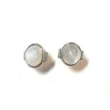 A pair of star sapphire and diamond earstuds,