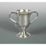 A George III silver two handled trophy cup by Peter & Ann Bateman,