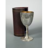 A Victorian silver goblet with a fitted case,