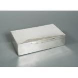 An Edward VII silver table cigarette box,