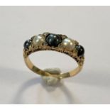 A black and white pearl and diamond ring,