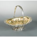 A 19th century Russian metalwares silver swing handled cake basket,