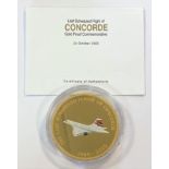 A gold proof commemorative coin for 'The last scheduled flight of Concorde' (2003),