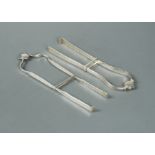Two pairs of George III silver sandwich serving tongs,
