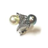A modern pearl and diamond 'night and day' ring,