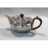 A George III silver teapot,