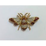 A 20th Century ruby and diamond set bee brooch,