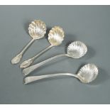 A pair of George IV silver sauce ladles, together with a Victorian pair,