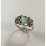 An Art Deco style aquamarine and diamond ring,