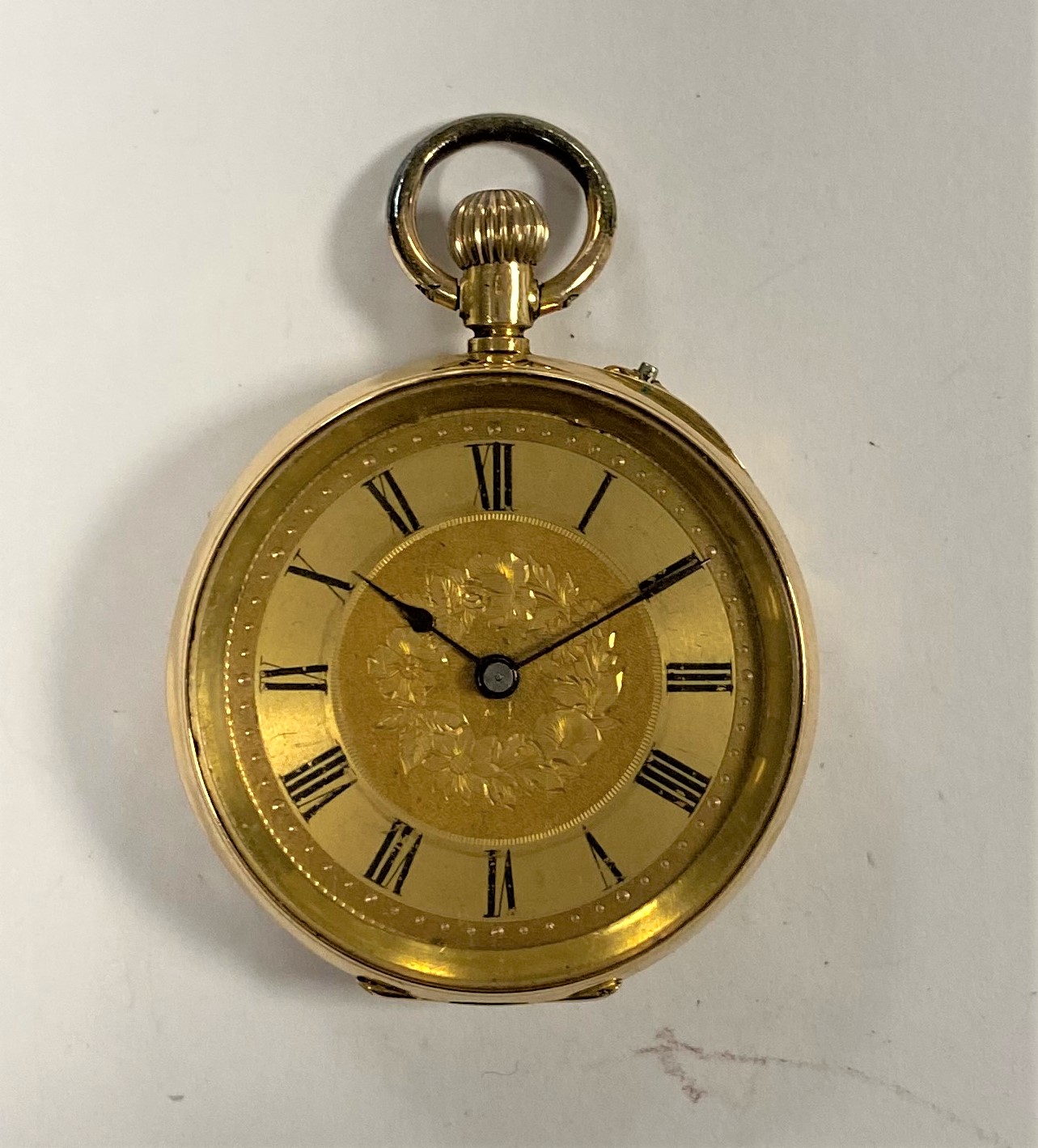 Unsigned – A lady’s Swiss 18ct gold open faced fob watch retailed by L.G. Weygang, Guernsey,