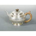 A George IV silver teapot by Garrard & Co,