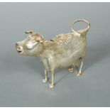 A continental metalwares Schuppe style cow creamer,