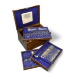 A canteen containing a 103 piece set of Edward VII silver flatware with three additions,
