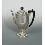 A Victorian silver coffee pot,