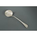 A George IV silver soup ladle,