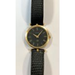 Gucci - A gentleman's strap watch,