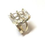 A modern rock crystal statement ring,