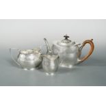 A mainly Edward VII silver harlequin 3 piece tea service,