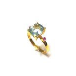 An aquamarine and ruby ring,