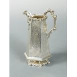 An unusual Victorian silver cream jug,