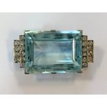 An Art Deco aquamarine and diamond brooch,