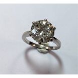 An impressive single stone diamond ring,