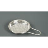 A George III silver lemon strainer,