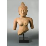 A Khmer sandstone bust of Buddha,