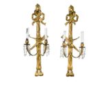 A pair of gilt gesso wall lights,