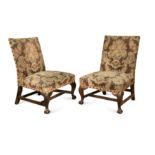 A pair of George I style library chairs,