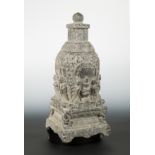 A Chinese grey stone lidded stupa urn, Sui Dynasty style,