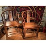 A pair of Chinese horse shoe backed hardwood armchairs Quanli,