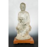 A Chinese stone seated Arhat, perhaps Tang Dynasty (618 AD - 907 AD),