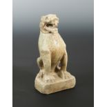 A Chinese green stone seated lion, in late Tang Dynasty style,