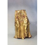 A Tibetan gilt-copper lower torso fragment of a deity, 18th century,