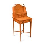 A Regency style satinwood cheveret,