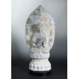 A Chinese grey stone figure of a seated Buddha, in Wei Dynasty style,