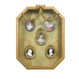 A 19th century gilt wood display case containing five assorted portrait miniatures,