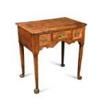 A George II burr maple and oak lowboy,